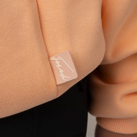 FOXED® STATEMENT OVERSIZE SWEATER FUZZ PEACH WMN
