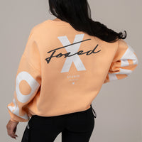 FOXED® STATEMENT OVERSIZE SWEATER FUZZ PEACH WMN
