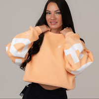 FOXED® STATEMENT OVERSIZE SWEATER FUZZ PEACH WMN